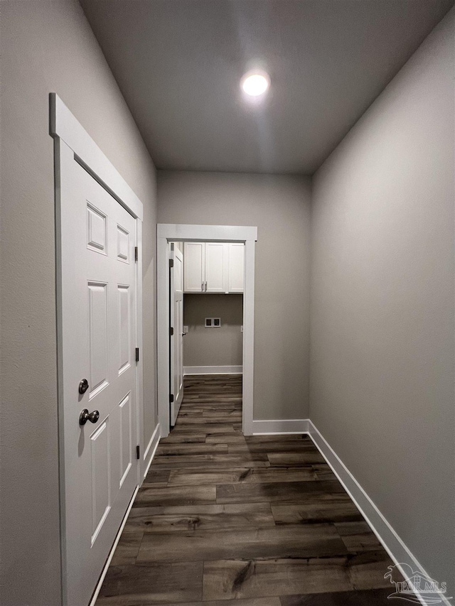 hall featuring dark hardwood / wood-style floors