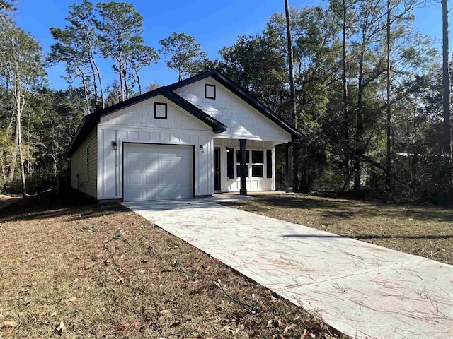 view of front of home with a garage