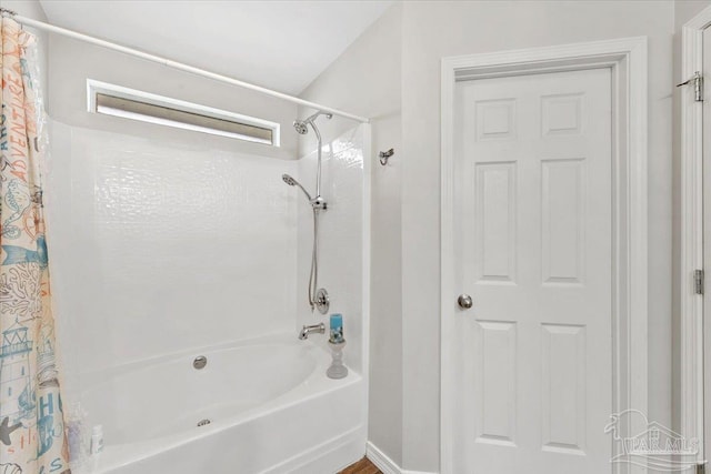 bathroom with shower / bath combo