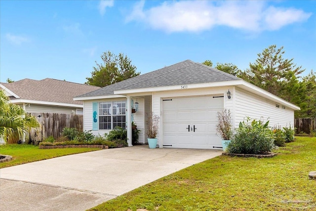 single story home featuring a garage and a front lawn