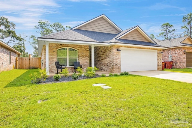 2956 N 17th Ave, Milton, FL 32583 - view of front facade featuring a garage, a porch, driveway, and brick siding