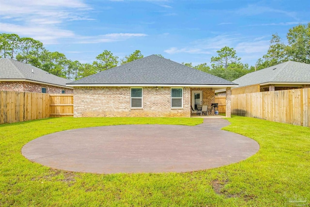2956 N 17th Ave, Milton, FL 32583 - rear view of property with a patio area, brick siding, and a shingled roof