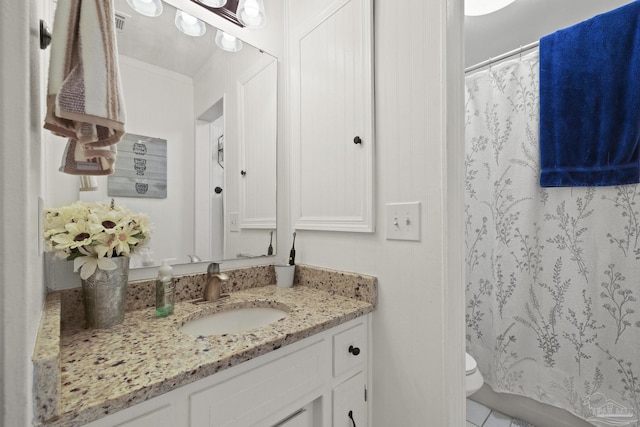 bathroom featuring ornamental molding, vanity, toilet, and a shower with shower curtain