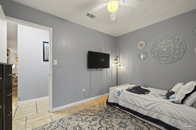 bedroom with light tile patterned floors and ceiling fan