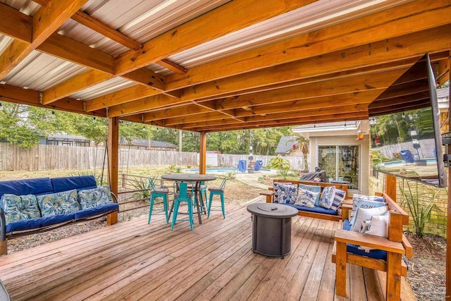 wooden terrace with outdoor lounge area