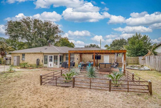 back of property featuring a patio