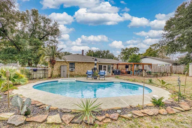 view of swimming pool with a patio