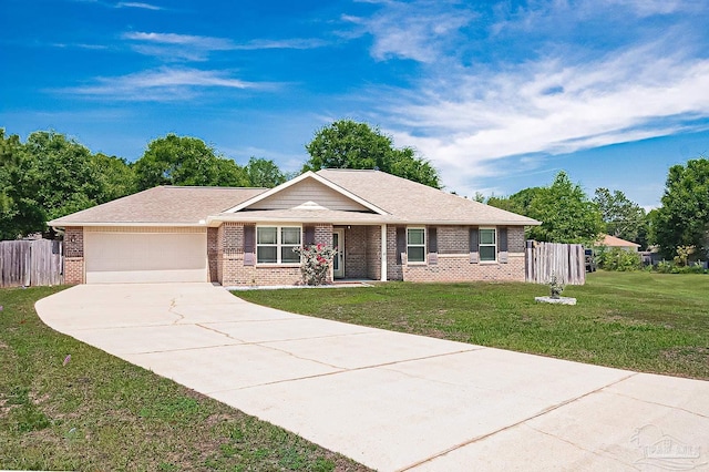 5629 Rosedown Ct, Milton, FL 32583 - ranch-style home with brick siding, an attached garage, and driveway