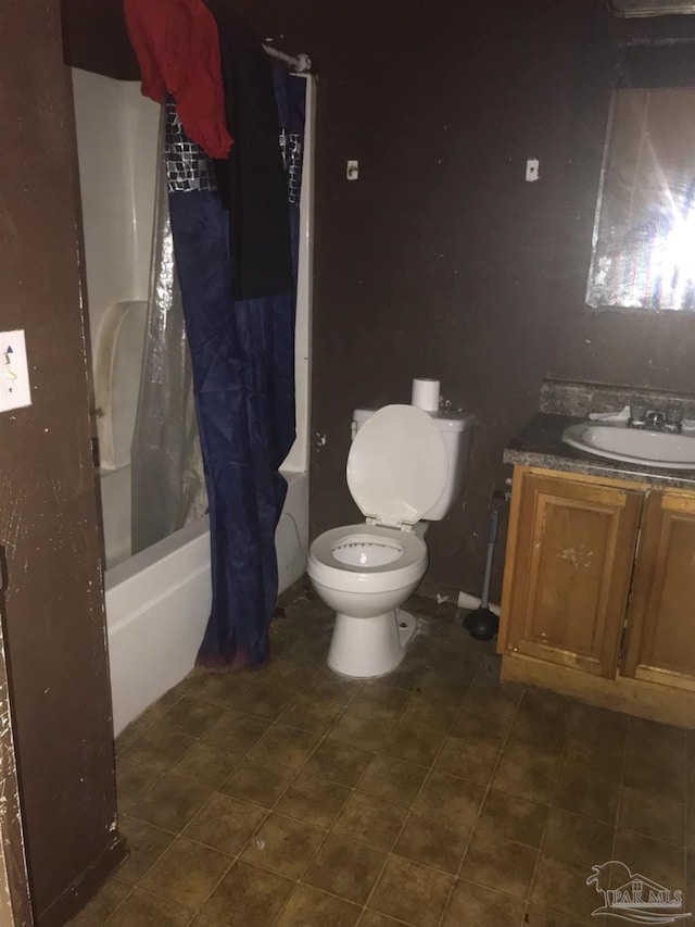 full bathroom with toilet, shower / bath combo, and vanity