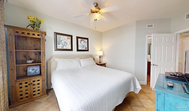 931 W Beach Blvd Unit 501, Gulf Shores, AL 36542 - bedroom with light tile patterned floors and a ceiling fan