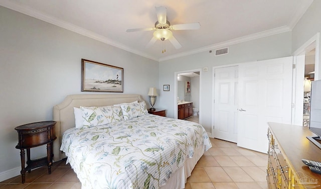 931 W Beach Blvd Unit 501, Gulf Shores, AL 36542 - bedroom with light tile patterned flooring, crown molding, baseboards, a ceiling fan, and connected bathroom