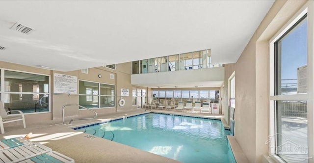 931 W Beach Blvd Unit 501, Gulf Shores, AL 36542 - indoor community pool featuring a patio area
