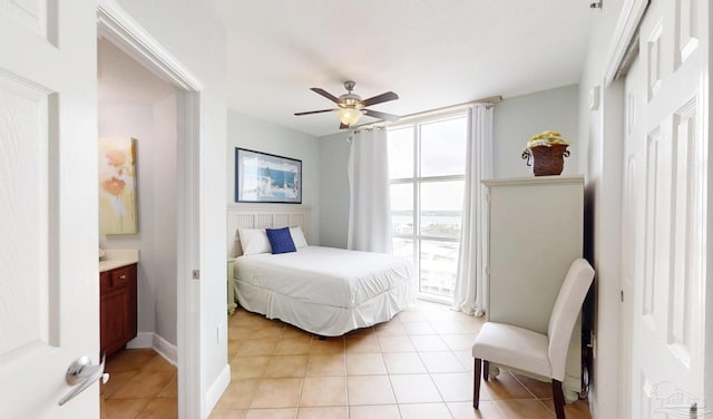 931 W Beach Blvd Unit 501, Gulf Shores, AL 36542 - bedroom featuring light tile patterned floors and ceiling fan