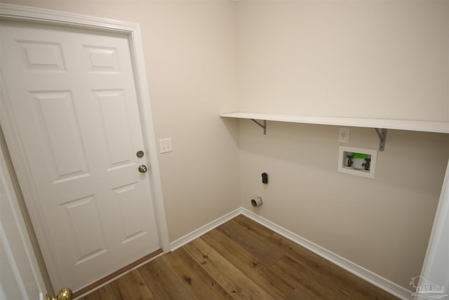 washroom with laundry area, baseboards, hookup for a washing machine, and wood finished floors