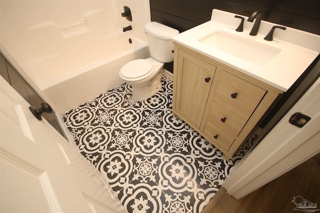 full bath with toilet, tile patterned floors, and vanity