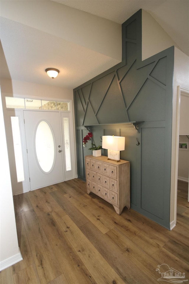 foyer with hardwood / wood-style floors