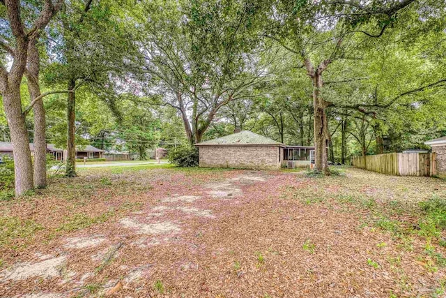 921 Candlestick Dr, Pensacola, FL 32514 - view of yard featuring view of wooded area