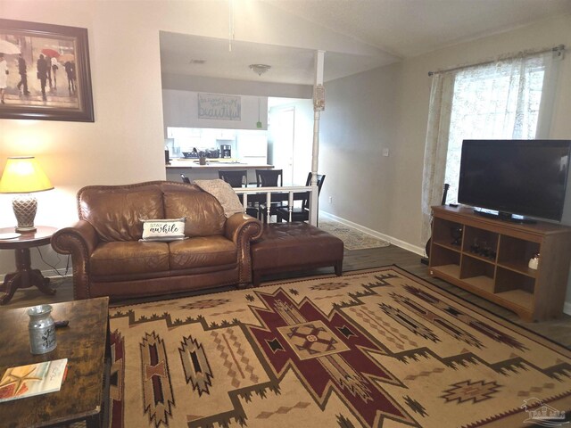 5358 Jenny Cir, Pace, FL 32571 - living area featuring lofted ceiling and wood finished floors