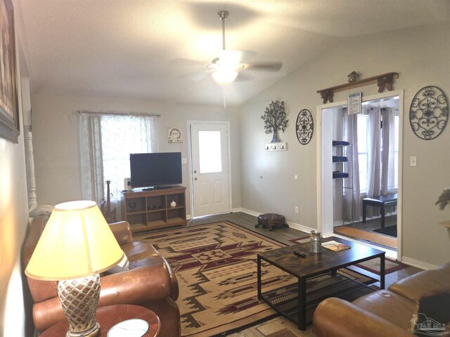 5358 Jenny Cir, Pace, FL 32571 - living room featuring ceiling fan and vaulted ceiling