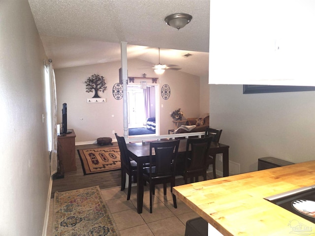 5358 Jenny Cir, Pace, FL 32571 - dining area with light tile patterned flooring, lofted ceiling, and a ceiling fan