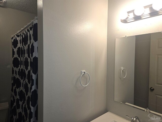 5358 Jenny Cir, Pace, FL 32571 - full bathroom featuring vanity and a shower with shower curtain