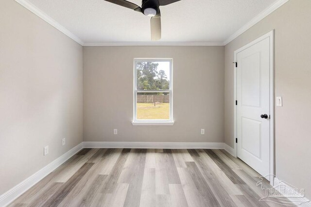 9317 Alekai Dr, Pensacola, FL 32526 - empty room featuring ceiling fan, ornamental molding, and light wood finished floors