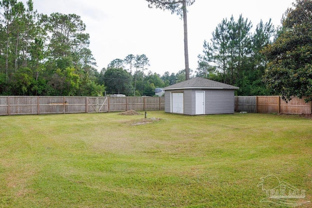 9317 Alekai Dr, Pensacola, FL 32526 - fenced backyard featuring an outbuilding and view of wooded area