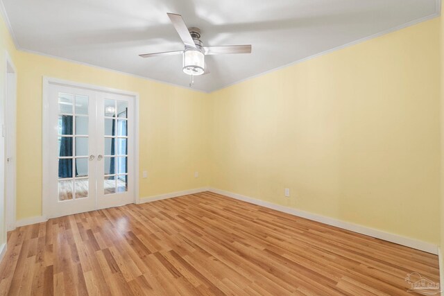 8150 Northpointe Blvd, Pensacola, FL 32514 - spare room featuring french doors, crown molding, light wood finished floors, baseboards, and a ceiling fan
