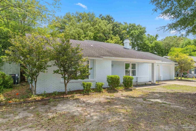 8150 Northpointe Blvd, Pensacola, FL 32514 - ranch-style home featuring an attached garage, brick siding, roof with shingles, and concrete driveway