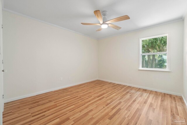 8150 Northpointe Blvd, Pensacola, FL 32514 - spare room featuring light wood-type flooring, baseboards, a ceiling fan, and crown molding