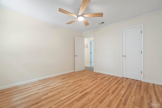 8150 Northpointe Blvd, Pensacola, FL 32514 - unfurnished bedroom with crown molding, light wood-style floors, baseboards, and a ceiling fan