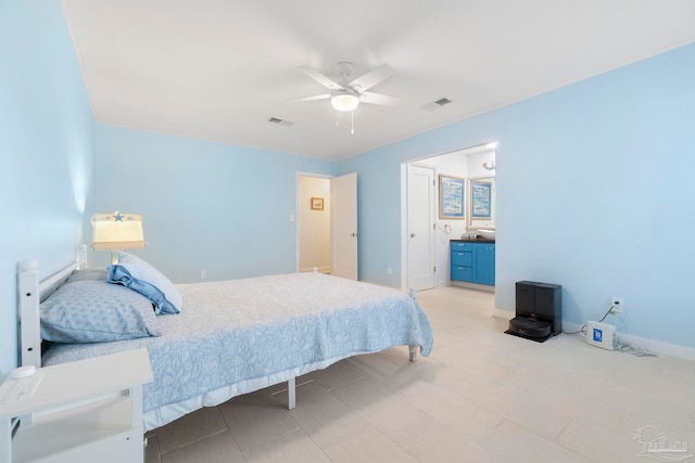8150 Northpointe Blvd, Pensacola, FL 32514 - bedroom with baseboards, a ceiling fan, and ensuite bath