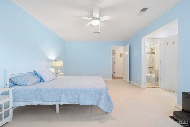 8150 Northpointe Blvd, Pensacola, FL 32514 - bedroom with a ceiling fan and connected bathroom