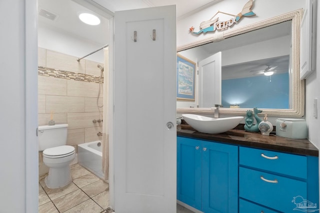 8150 Northpointe Blvd, Pensacola, FL 32514 - bathroom with toilet, vanity, ceiling fan, and shower / tub combination