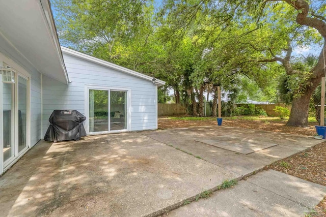8150 Northpointe Blvd, Pensacola, FL 32514 - view of patio with a fenced backyard and grilling area