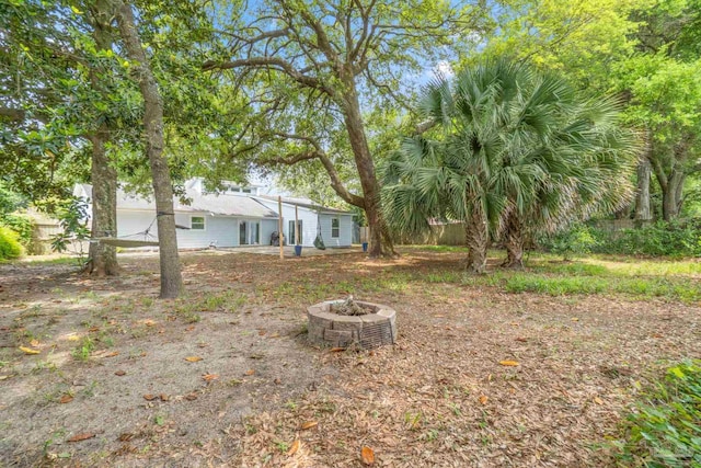 8150 Northpointe Blvd, Pensacola, FL 32514 - view of yard featuring a fire pit