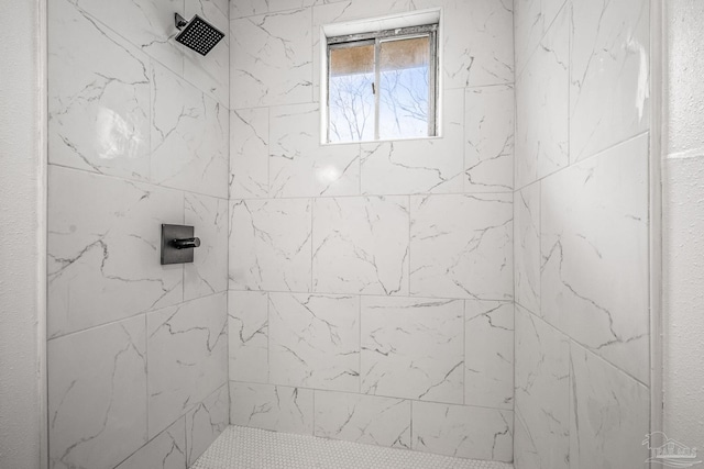 full bathroom featuring a tile shower