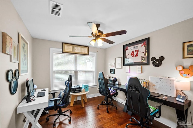 office area with ceiling fan and dark hardwood / wood-style floors