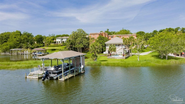 dock area with boat lift and a water view