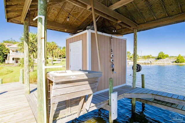 view of dock with a water view