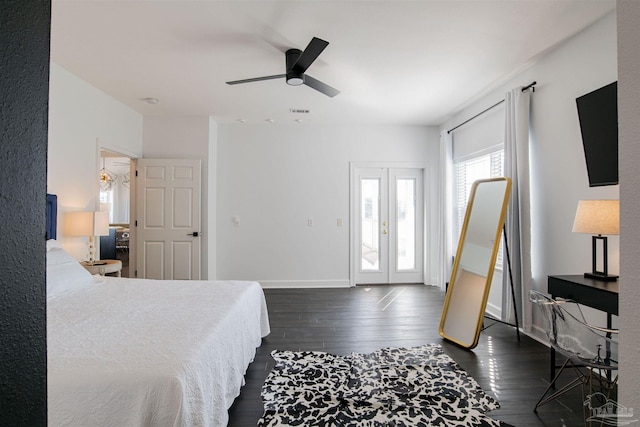 bedroom featuring visible vents, baseboards, dark wood-style floors, access to outside, and a ceiling fan