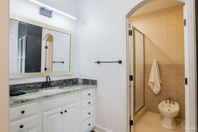 bathroom with vanity, a bidet, tile patterned flooring, and a shower stall