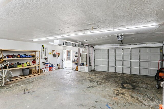 4662 Oakland Dr, Pensacola, FL 32526 - garage featuring a garage door opener