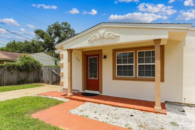 4662 Oakland Dr, Pensacola, FL 32526 - view of exterior entry featuring stucco siding