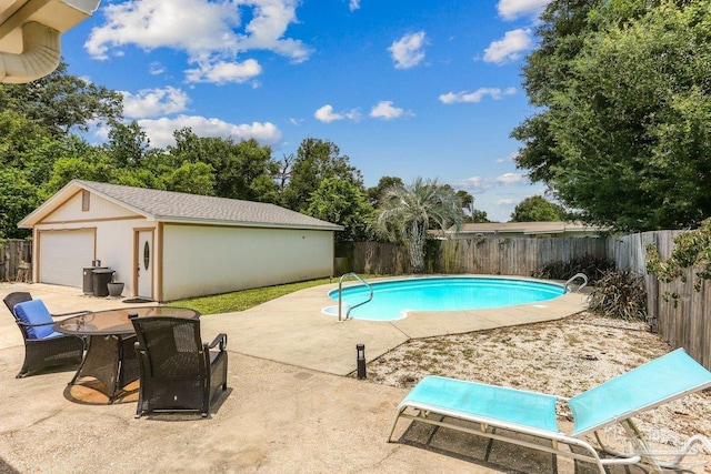 4662 Oakland Dr, Pensacola, FL 32526 - view of swimming pool featuring a fenced backyard, a patio area, and an outbuilding