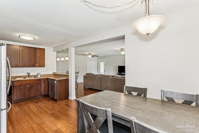 4662 Oakland Dr, Pensacola, FL 32526 - dining room featuring dark wood-type flooring and ceiling fan