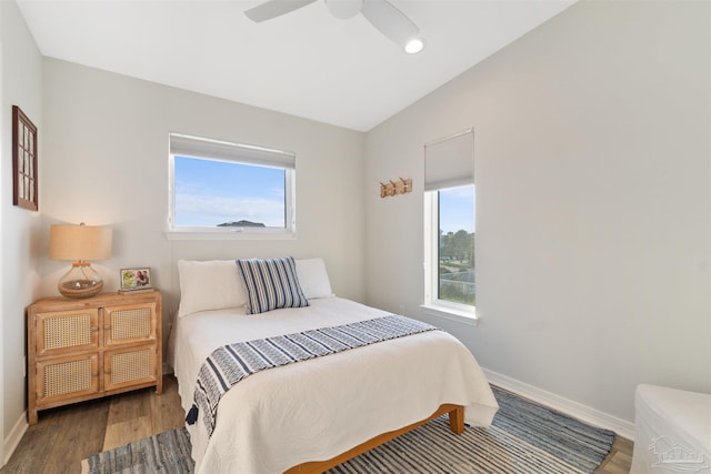 bedroom featuring ceiling fan and wood-type flooring