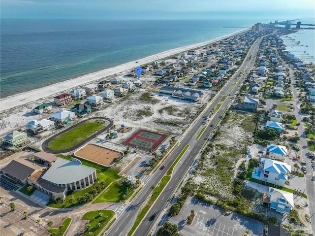 aerial view featuring a water view and a beach view