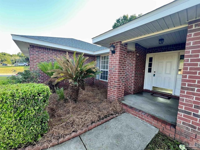 4888 La Casa Cir, Pace, FL 32571 - doorway to property featuring brick siding