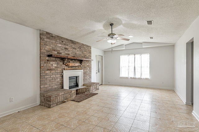 10449 Bernice Rd, Milton, FL 32583 - unfurnished living room with a ceiling fan, vaulted ceiling, a brick fireplace, baseboards, and light tile patterned floors